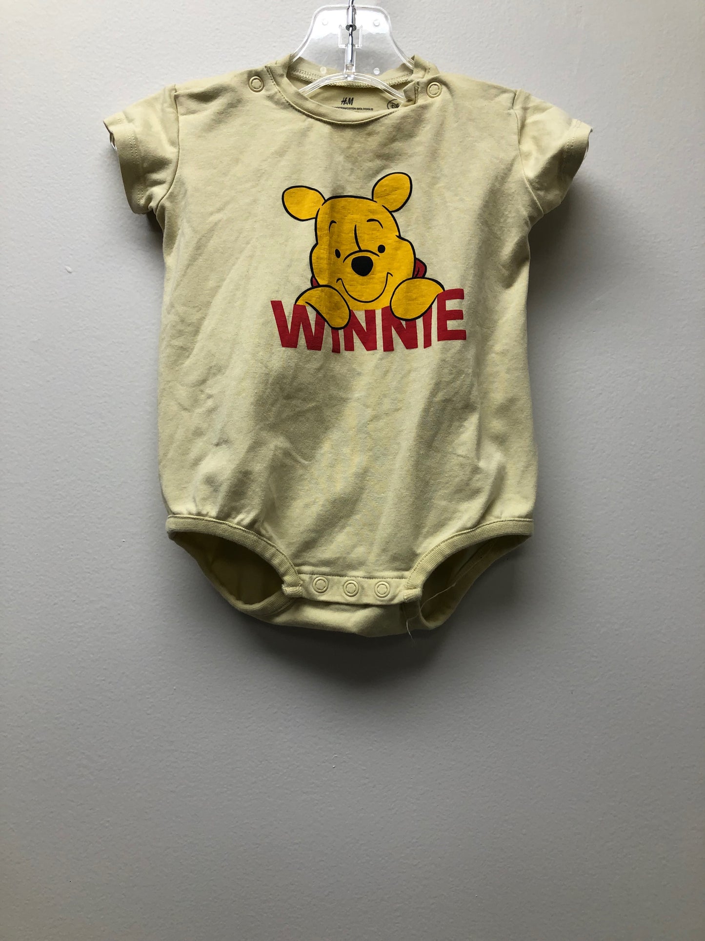 6m H & M pale yellow Winnie the Pooh Romper