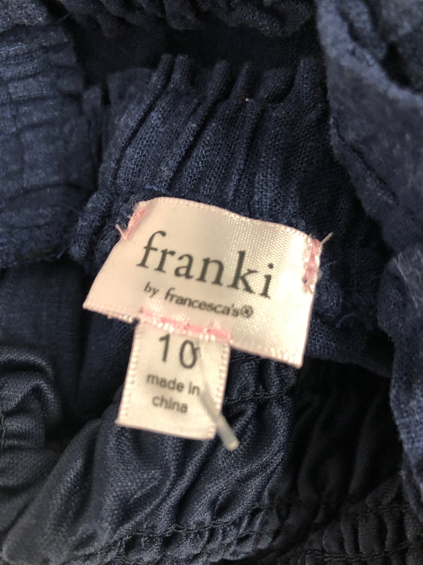 10 Franki navy smocked Jumpsuit